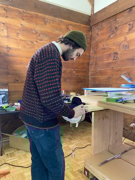 Seb working on a Baseball Cap